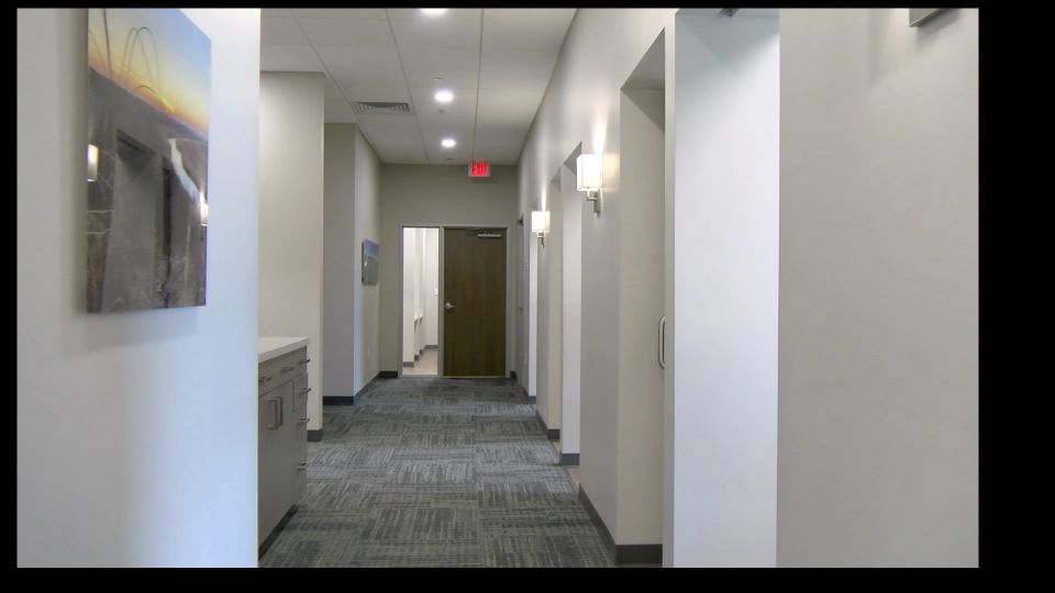 Office hallway at {PRACTICE_NAME}